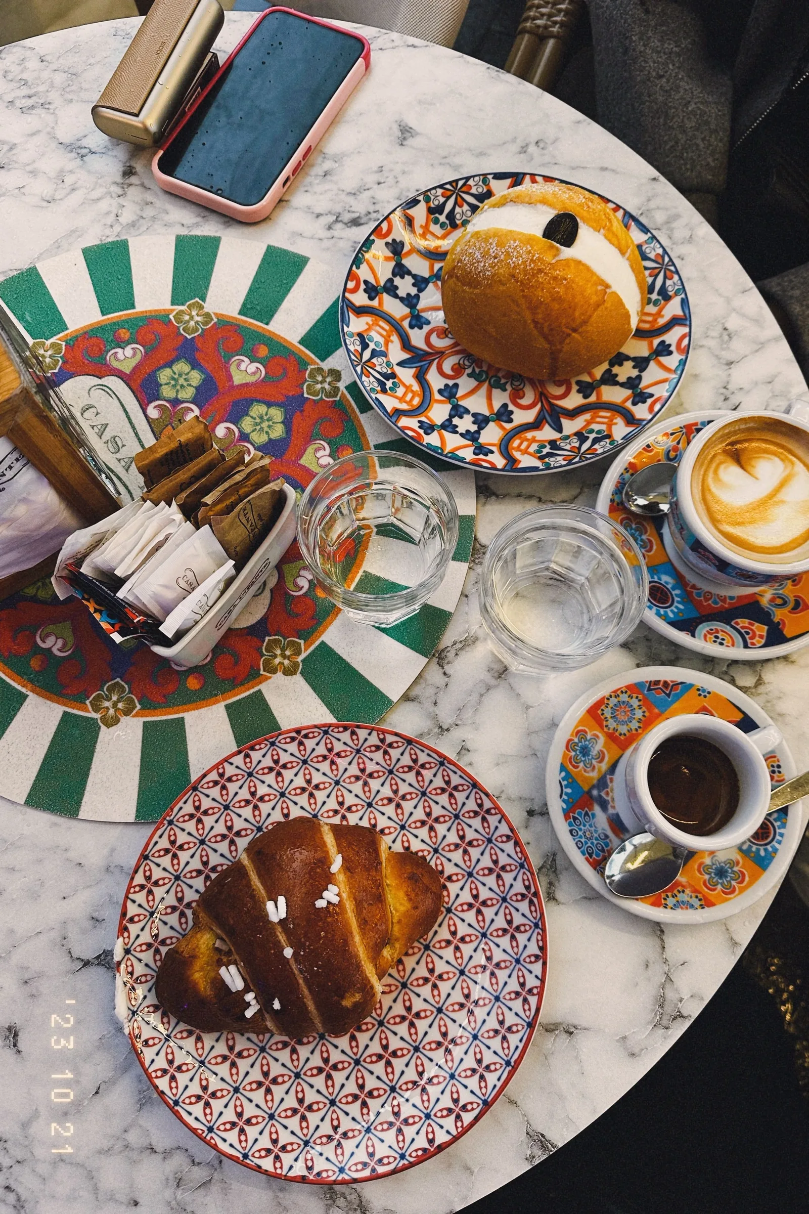 Breakfast table with painted plates